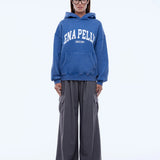 ENA PELLY - Varsity Hoodie - Washed Indigo